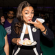 Illustration for article titled Alexandria Ocasio-Cortez Made History, Ate Cake, and Her Lipstick Remained Intact the Entire Time